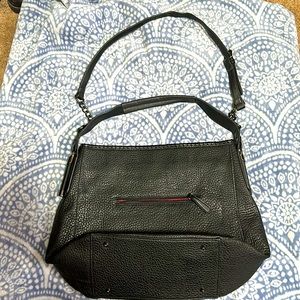 Large women faux leather hobo handbag.